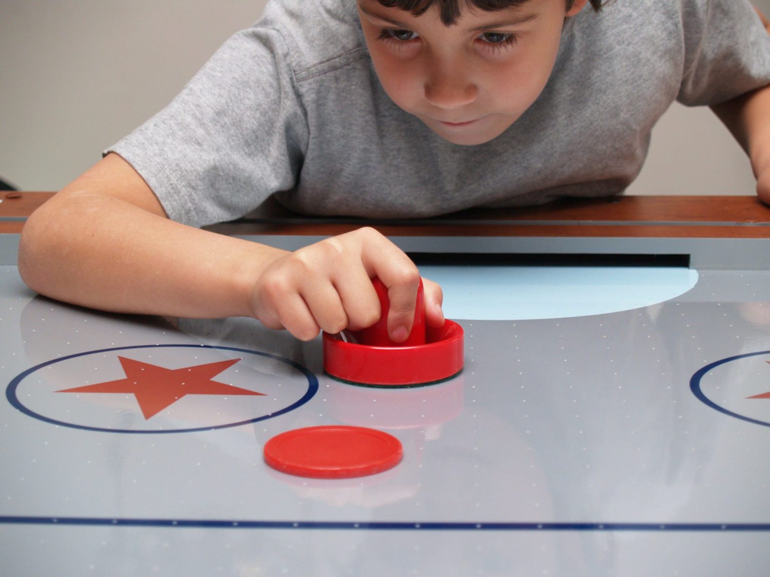 Remember the classic arcade and game room game air hockey? Learn how to play air hockey and the air hockey rules at www.GameOnFamily.com. Game on!